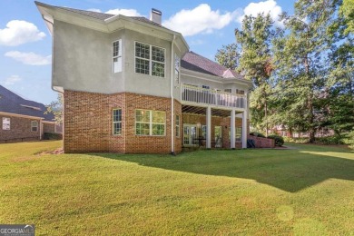 Absolutely stunning home located in the gated Eagles Landing on Eagles Landing Country Club in Georgia - for sale on GolfHomes.com, golf home, golf lot