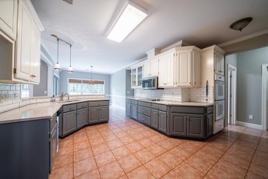 Welcome to 4880 Turnberry Lane - a classic Southern home with on Maple Ridge Golf Club in Georgia - for sale on GolfHomes.com, golf home, golf lot