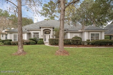 The epitome of luxurious, country club living, nestled within on Country Club of Orange Park in Florida - for sale on GolfHomes.com, golf home, golf lot