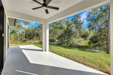 Experience modern luxury and family-friendly living in this on Lehigh Resort Club in Florida - for sale on GolfHomes.com, golf home, golf lot