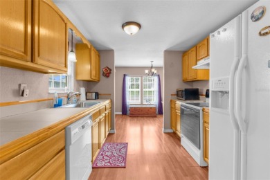 Beautifully Updated 3-Bedroom, 2-Bath Home with A Bonus Lot on High Point Golf Club, Inc. in Florida - for sale on GolfHomes.com, golf home, golf lot