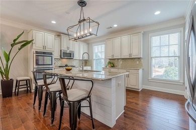 Exquisite END-UNIT townhome in the PRESTIGIOUS GATED community on Rivermont Golf and Country Club in Georgia - for sale on GolfHomes.com, golf home, golf lot