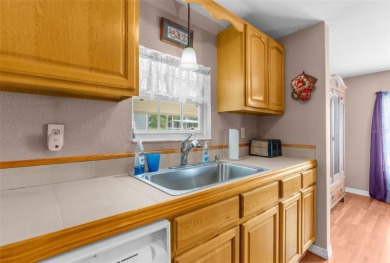 Beautifully Updated 3-Bedroom, 2-Bath Home with A Bonus Lot on High Point Golf Club, Inc. in Florida - for sale on GolfHomes.com, golf home, golf lot