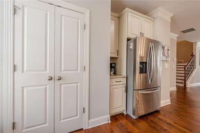 Exquisite END-UNIT townhome in the PRESTIGIOUS GATED community on Rivermont Golf and Country Club in Georgia - for sale on GolfHomes.com, golf home, golf lot