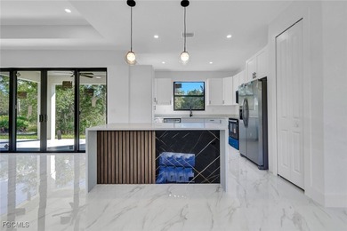 Experience modern luxury and family-friendly living in this on Lehigh Resort Club in Florida - for sale on GolfHomes.com, golf home, golf lot