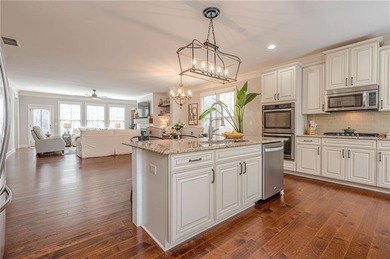 Exquisite END-UNIT townhome in the PRESTIGIOUS GATED community on Rivermont Golf and Country Club in Georgia - for sale on GolfHomes.com, golf home, golf lot