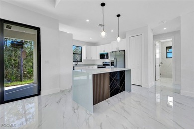 Experience modern luxury and family-friendly living in this on Lehigh Resort Club in Florida - for sale on GolfHomes.com, golf home, golf lot