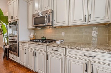 Exquisite END-UNIT townhome in the PRESTIGIOUS GATED community on Rivermont Golf and Country Club in Georgia - for sale on GolfHomes.com, golf home, golf lot