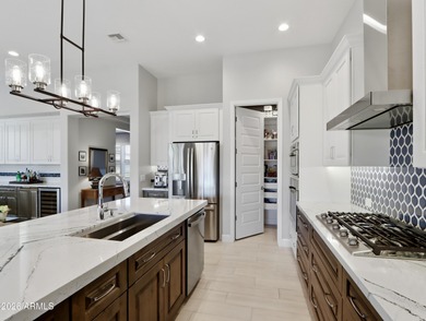 This stunning Mandera model offers a rare opportunity to own an on Tuscany Falls At Pebble Creek in Arizona - for sale on GolfHomes.com, golf home, golf lot