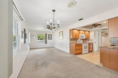 Perfectly positioned in highly desirable Venice East, this on Venice East Golf Club in Florida - for sale on GolfHomes.com, golf home, golf lot