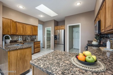 Welcome to 2604 Cody Circle, a beautiful and spacious 3-bedroom on Sonoma Ranch Golf Course in New Mexico - for sale on GolfHomes.com, golf home, golf lot