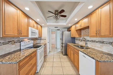 Perfectly positioned in highly desirable Venice East, this on Venice East Golf Club in Florida - for sale on GolfHomes.com, golf home, golf lot