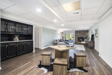 Sprawling, fully renovated walk-out ranch on over an acre with on Pine View Golf Club in Michigan - for sale on GolfHomes.com, golf home, golf lot