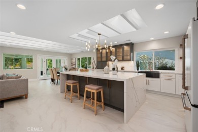 Welcome home to this stunning designer remodeled Casa Grande on Leisure Village Par 3 Golf Course in California - for sale on GolfHomes.com, golf home, golf lot