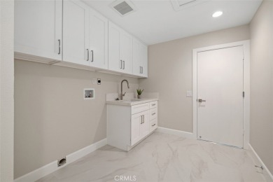Welcome home to this stunning designer remodeled Casa Grande on Leisure Village Par 3 Golf Course in California - for sale on GolfHomes.com, golf home, golf lot
