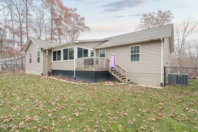 Experience easy, modern living in this 2021 Lake Tansi home on Lake Tansi Village Country Club in Tennessee - for sale on GolfHomes.com, golf home, golf lot