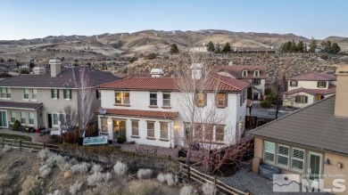 Come experience breathtaking mountain and valley views from this on Somersett Country Club in Nevada - for sale on GolfHomes.com, golf home, golf lot