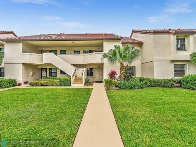 Serene 2nd Floor, Lakefront 2/2 w/vaulted ceilings & a split on The Links At Boynton Beach - The Family Course in Florida - for sale on GolfHomes.com, golf home, golf lot