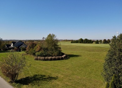 This prime 1-acre lot in the sought-after Woodlawn Estates on Peninsula Golf Resort in Kentucky - for sale on GolfHomes.com, golf home, golf lot