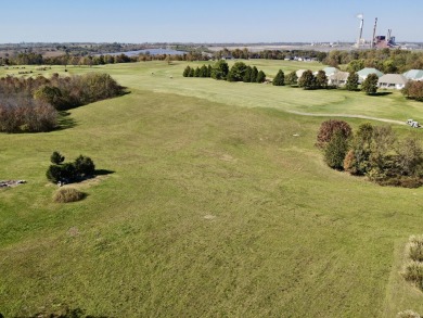 This prime 1-acre lot in the sought-after Woodlawn Estates on Peninsula Golf Resort in Kentucky - for sale on GolfHomes.com, golf home, golf lot