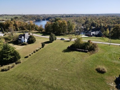 This prime 1-acre lot in the sought-after Woodlawn Estates on Peninsula Golf Resort in Kentucky - for sale on GolfHomes.com, golf home, golf lot