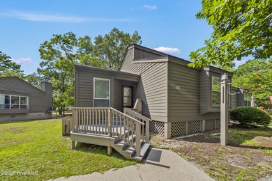Resort community living is waiting for you. This 2bd/2ba condo on Harbour Point Golf Club in North Carolina - for sale on GolfHomes.com, golf home, golf lot