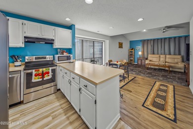 Resort community living is waiting for you. This 2bd/2ba condo on Harbour Point Golf Club in North Carolina - for sale on GolfHomes.com, golf home, golf lot