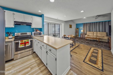Resort community living is waiting for you.  This 2bd/2ba condo on Harbour Point Golf Club in North Carolina - for sale on GolfHomes.com, golf home, golf lot