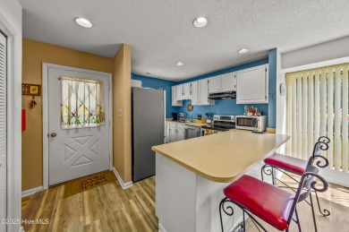 Resort community living is waiting for you.  This 2bd/2ba condo on Harbour Point Golf Club in North Carolina - for sale on GolfHomes.com, golf home, golf lot