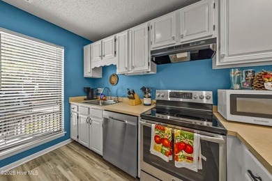 Resort community living is waiting for you. This 2bd/2ba condo on Harbour Point Golf Club in North Carolina - for sale on GolfHomes.com, golf home, golf lot