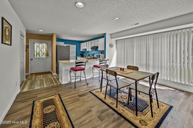 Resort community living is waiting for you.  This 2bd/2ba condo on Harbour Point Golf Club in North Carolina - for sale on GolfHomes.com, golf home, golf lot