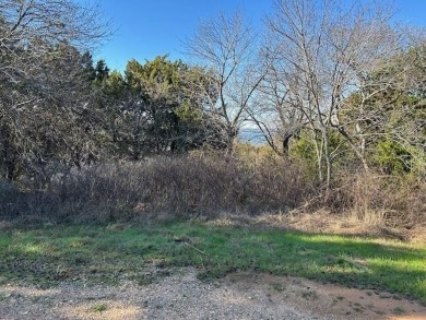 Great Lot with distant water view, partially cleared, backs up on White Bluff Resort - Old Course in Texas - for sale on GolfHomes.com, golf home, golf lot