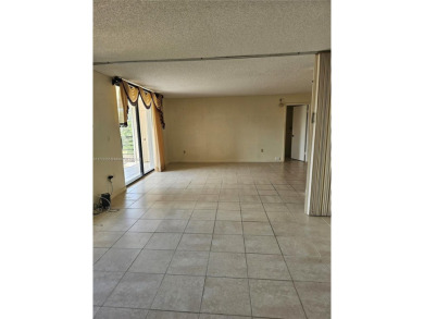 Location Location Location! Come view this 2 bedroom 2 bathroom on Pembroke Lakes Golf Club in Florida - for sale on GolfHomes.com, golf home, golf lot