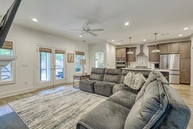 Welcome to this stunning, 4 bedroom/3 bathroom low-maintenance on Woodfin Ridge Golf Club in South Carolina - for sale on GolfHomes.com, golf home, golf lot