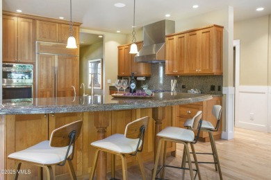 Tucked away on a quiet cul-de-sac in Eagle Ranch, this custom on Eagle Ranch in Colorado - for sale on GolfHomes.com, golf home, golf lot