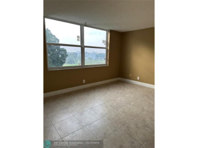 Located in the 55+ community of Palm Springs 2, this spacious 2 on Oriole Golf and Tennis Club in Florida - for sale on GolfHomes.com, golf home, golf lot