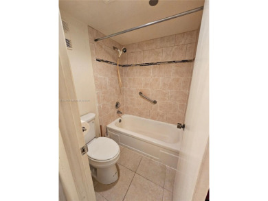 Location Location Location! Come view this 2 bedroom 2 bathroom on Pembroke Lakes Golf Club in Florida - for sale on GolfHomes.com, golf home, golf lot