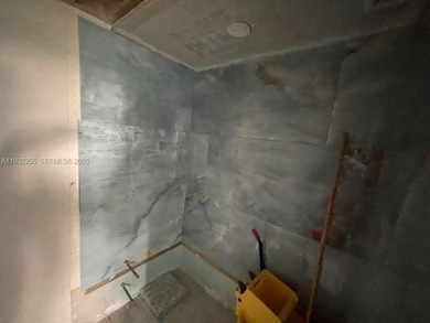 AMAZING *AS-IS* 2/2 corner unit Condo that sits on the beautiful on Coral Ridge Country Club in Florida - for sale on GolfHomes.com, golf home, golf lot