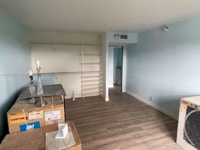 AMAZING *AS-IS* 2/2 corner unit Condo that sits on the beautiful on Coral Ridge Country Club in Florida - for sale on GolfHomes.com, golf home, golf lot