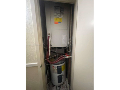 AMAZING *AS-IS* 2/2 corner unit Condo that sits on the beautiful on Coral Ridge Country Club in Florida - for sale on GolfHomes.com, golf home, golf lot