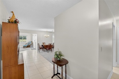 Located in the desirable Highgate F neighborhood of Kings Point on Falcon Watch Golf Club in Florida - for sale on GolfHomes.com, golf home, golf lot