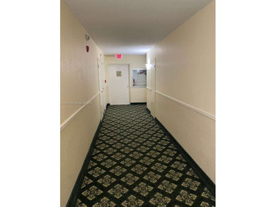 AMAZING *AS-IS* 2/2 corner unit Condo that sits on the beautiful on Coral Ridge Country Club in Florida - for sale on GolfHomes.com, golf home, golf lot