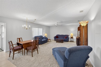Located in the desirable Highgate F neighborhood of Kings Point on Falcon Watch Golf Club in Florida - for sale on GolfHomes.com, golf home, golf lot