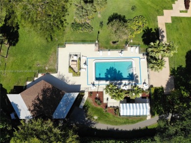 Location Location Location! Come view this 2 bedroom 2 bathroom on Pembroke Lakes Golf Club in Florida - for sale on GolfHomes.com, golf home, golf lot