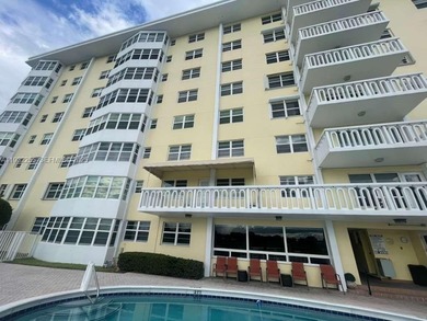 AMAZING *AS-IS* 2/2 corner unit Condo that sits on the beautiful on Coral Ridge Country Club in Florida - for sale on GolfHomes.com, golf home, golf lot