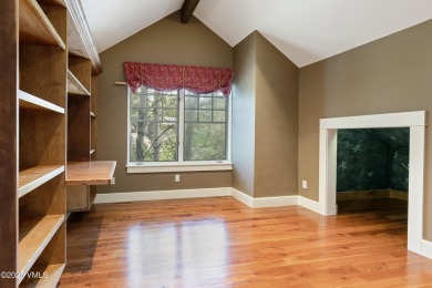 Tucked away on a quiet cul-de-sac in Eagle Ranch, this custom on Eagle Ranch in Colorado - for sale on GolfHomes.com, golf home, golf lot