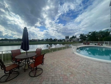 AMAZING *AS-IS* 2/2 corner unit Condo that sits on the beautiful on Coral Ridge Country Club in Florida - for sale on GolfHomes.com, golf home, golf lot