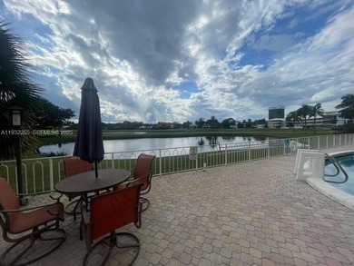 AMAZING *AS-IS* 2/2 corner unit Condo that sits on the beautiful on Coral Ridge Country Club in Florida - for sale on GolfHomes.com, golf home, golf lot