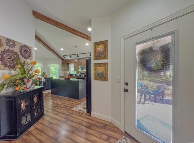 This beautifully updated and meticulously maintained golf course on Magellan Golf Course in Arkansas - for sale on GolfHomes.com, golf home, golf lot