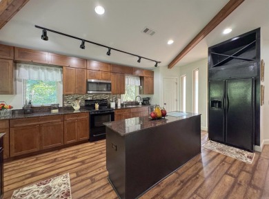 This beautifully updated and meticulously maintained golf course on Magellan Golf Course in Arkansas - for sale on GolfHomes.com, golf home, golf lot
